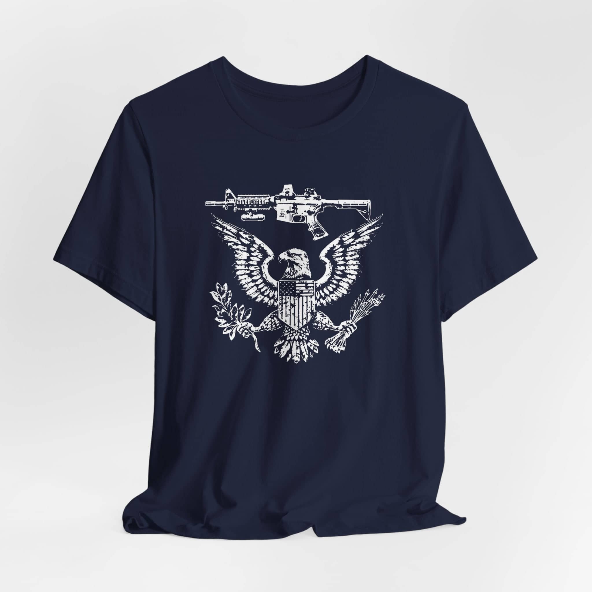 Patriotic Eagle and Rifle T-Shirt, American Flag Inspired Military Graphic Tee, Bold Eagle & Rifle Design, Proud USA Themed Apparel Unisex Jersey Short Sleeve Tee