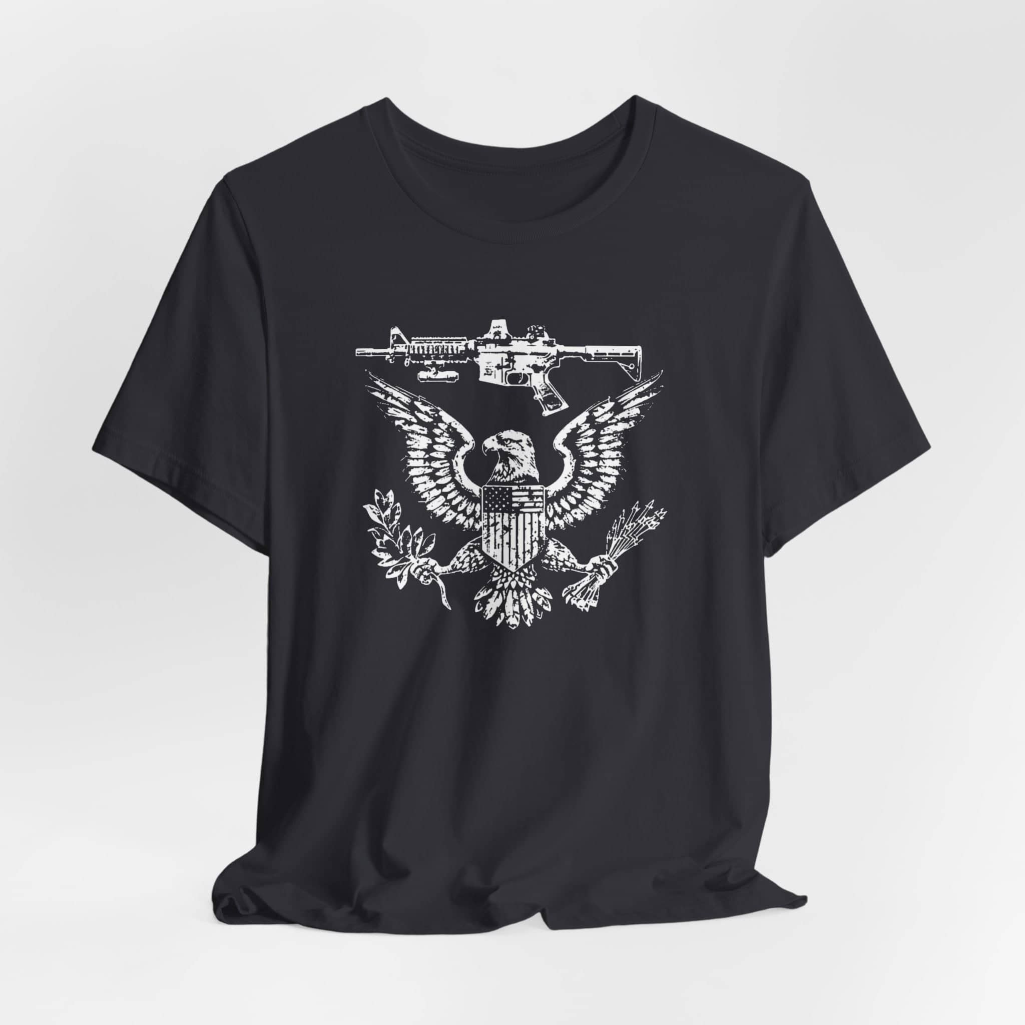 Patriotic Eagle and Rifle T-Shirt, American Flag Inspired Military Graphic Tee, Bold Eagle & Rifle Design, Proud USA Themed Apparel Unisex Jersey Short Sleeve Tee