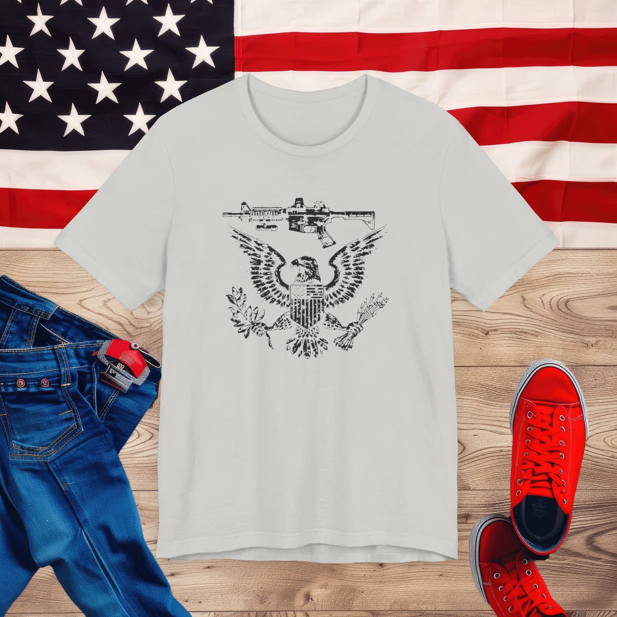 Patriotic Eagle and Rifle T-Shirt, American Flag Inspired Military Graphic Tee, Bold Eagle & Rifle Design, Proud USA Themed Apparel Unisex Jersey Short Sleeve Tee