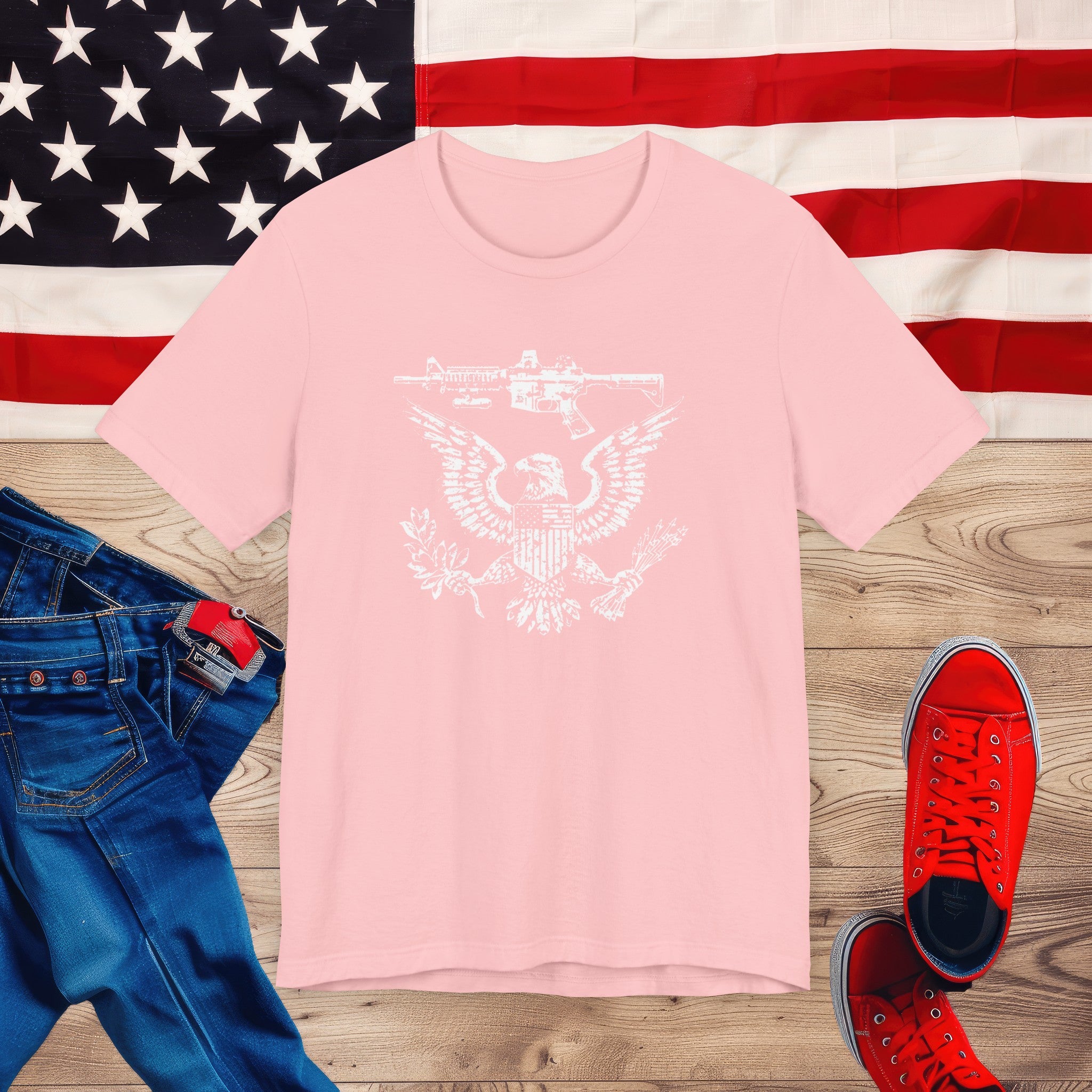 Patriotic Eagle and Rifle T-Shirt, American Flag Inspired Military Graphic Tee, Bold Eagle & Rifle Design, Proud USA Themed Apparel Unisex Jersey Short Sleeve Tee