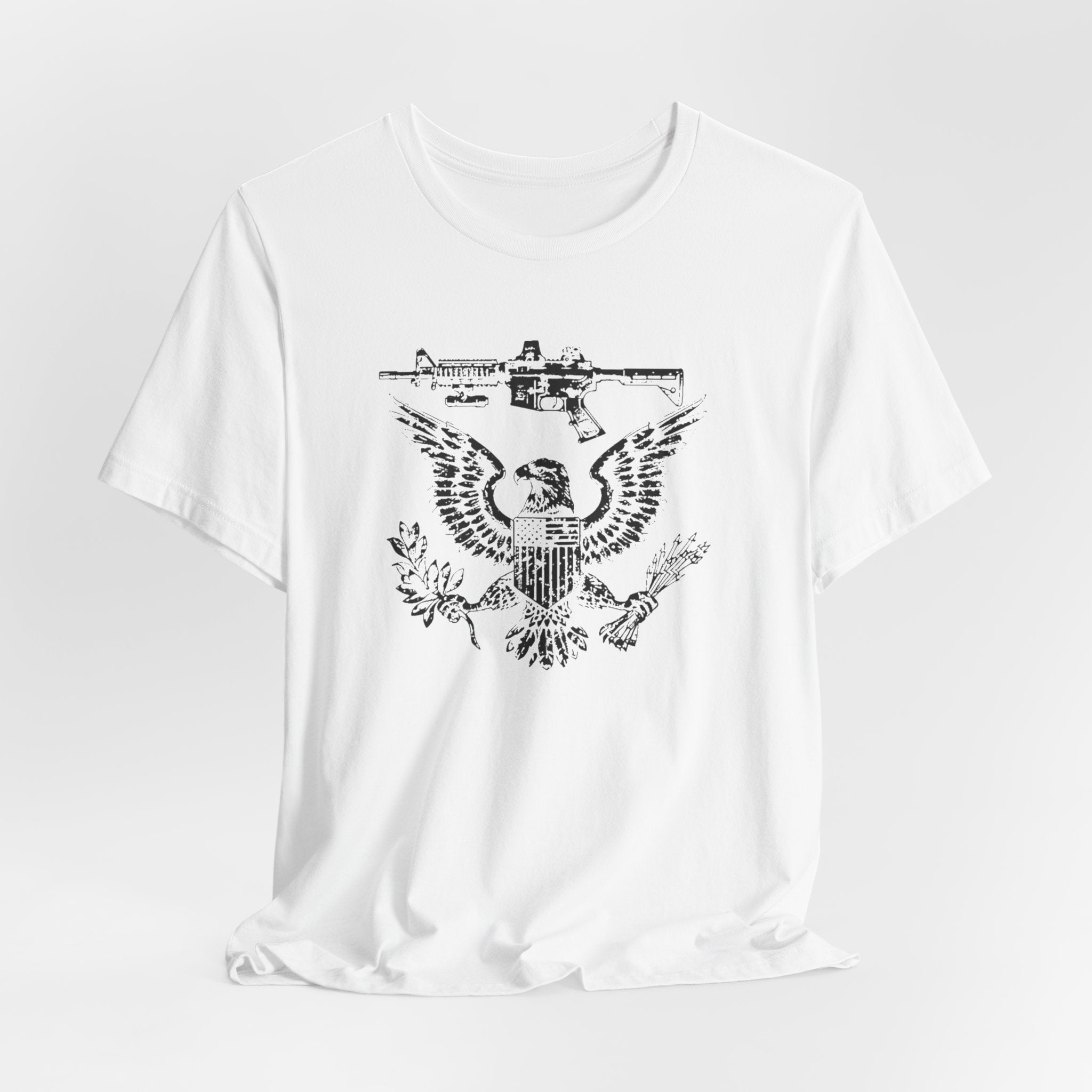 Patriotic Eagle and Rifle T-Shirt, American Flag Inspired Military Graphic Tee, Bold Eagle & Rifle Design, Proud USA Themed Apparel Unisex Jersey Short Sleeve Tee
